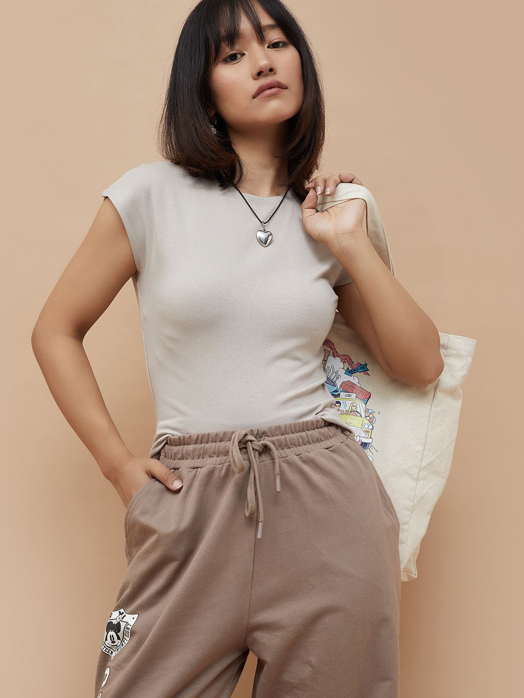 

Ginger by Lifestyle Women Solid Round Neck Cotton Top, Beige