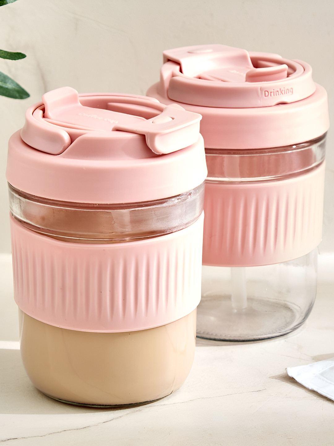 

Home Centre Fiesta Cole 2 Pieces Pink Glossy Glass Travel Mugs 380 ml