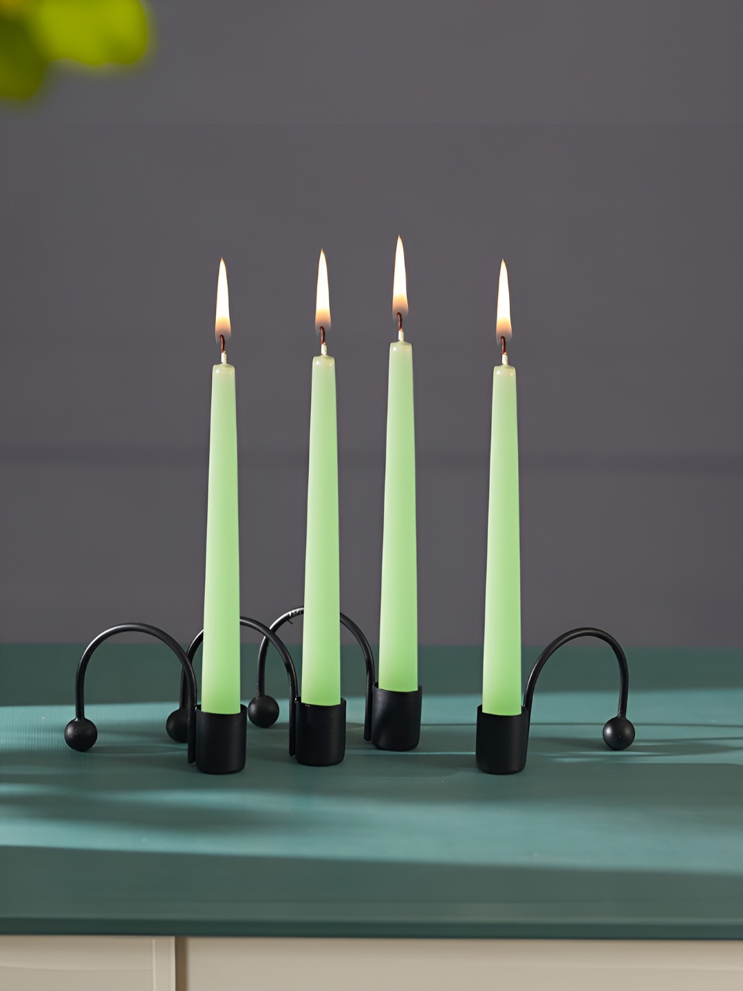 

Homspurts Black 4 Pieces Metal Candle Holder