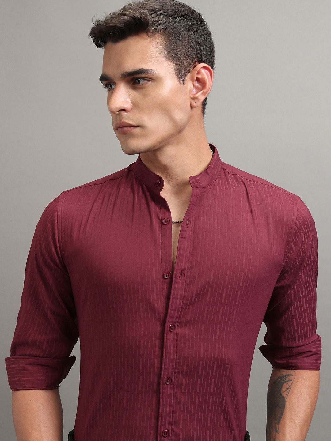 

Highlander Men Maroon Dobby Textured Solid Mandarin Collar Multi Occasion Shirt