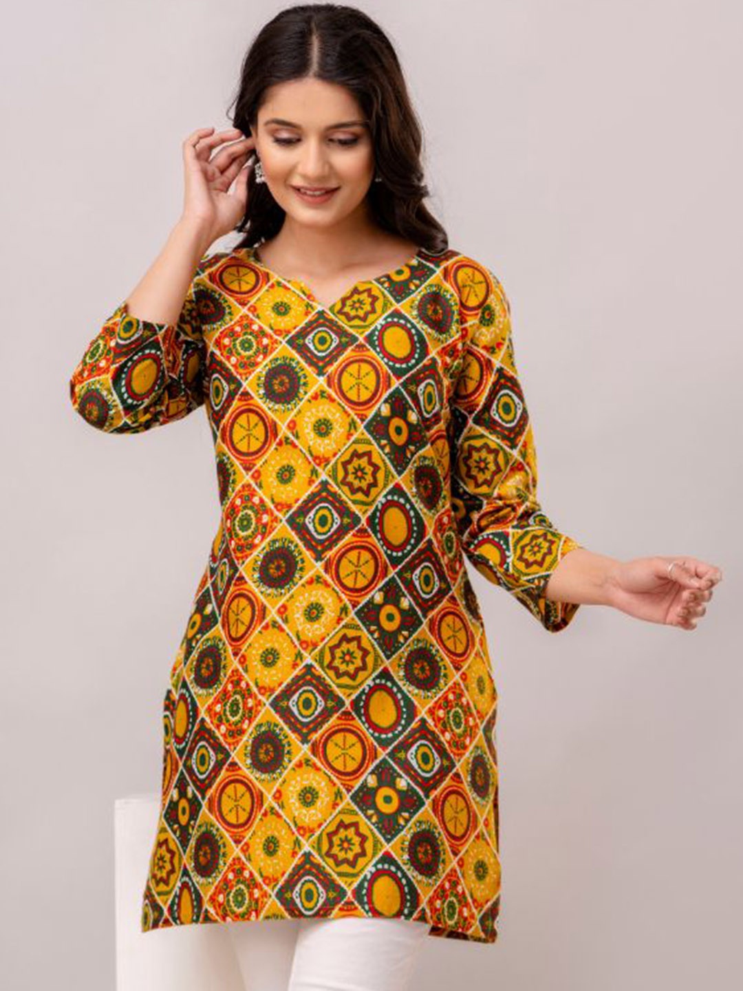 

Arudhi Abstract Printed Pure Cotton Straight Kurti, Yellow