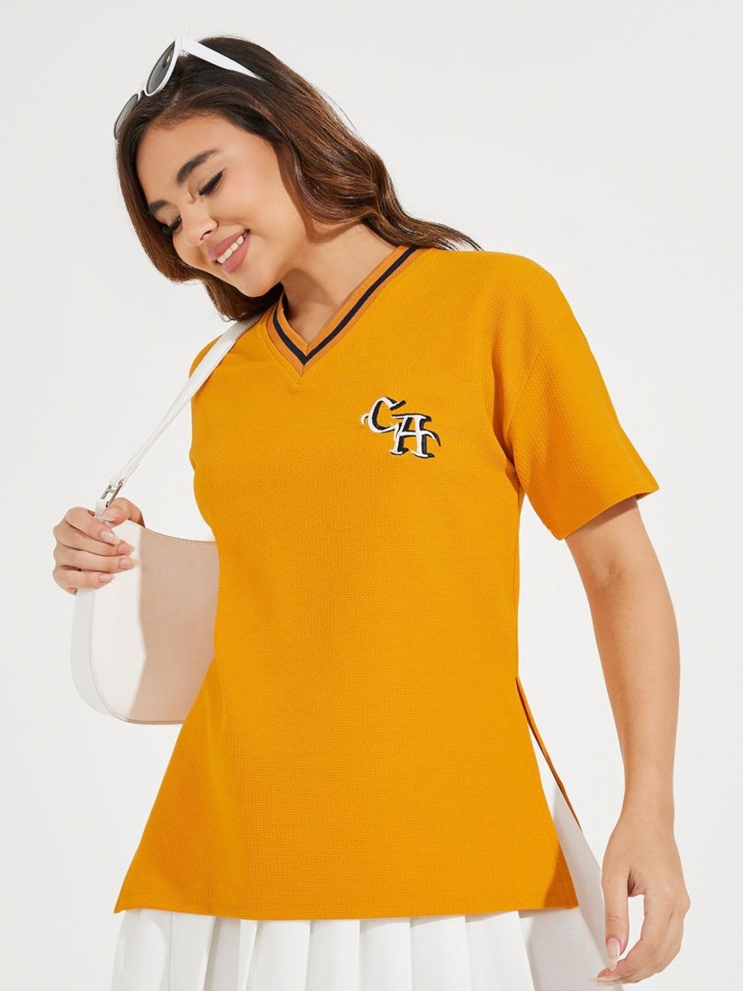 

Styli Women Solid V-Neck Oversized T-Shirt, Mustard