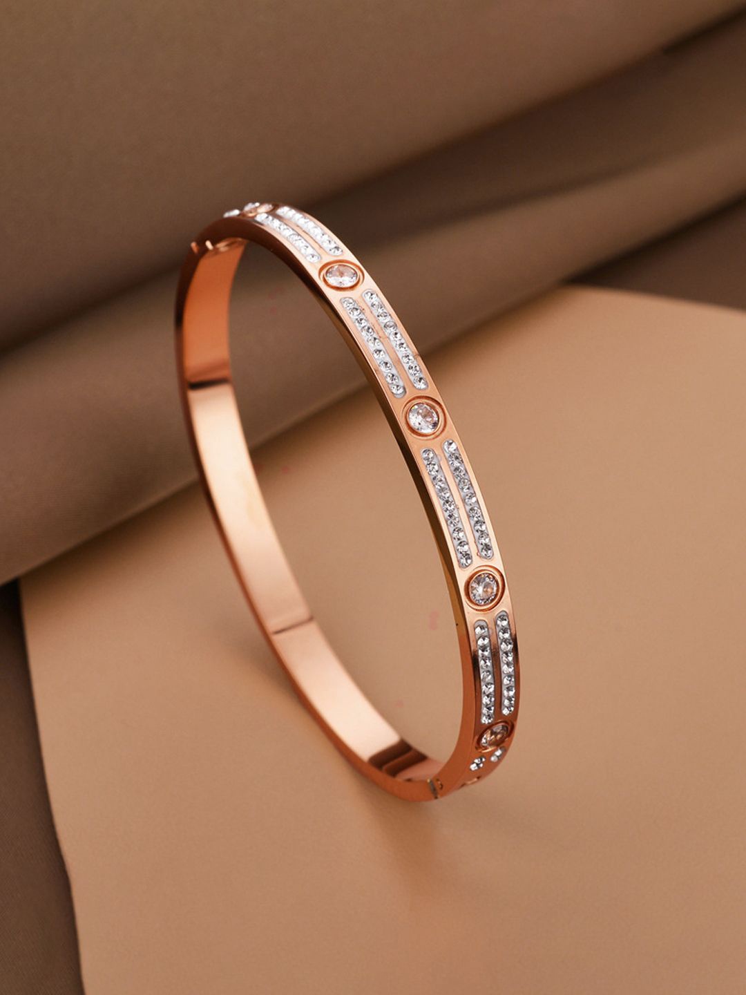 

Designs & You Rose Gold Plated Anti Tarnish AD Bangle Style Bracelet