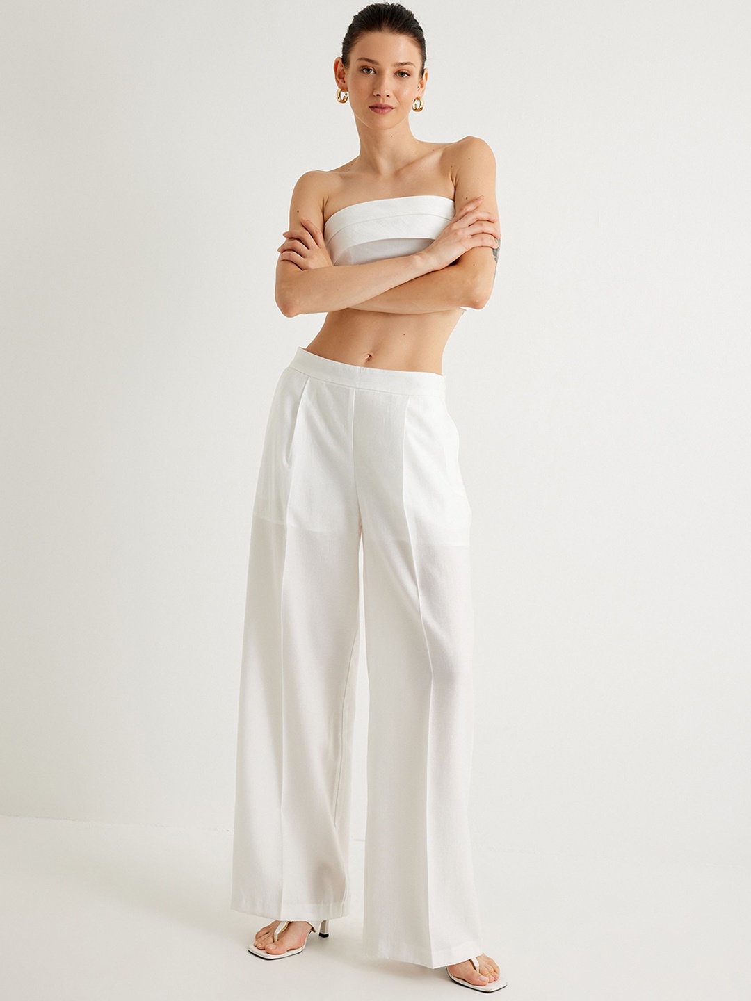 

Koton Women Mid-Rise Pleated Regular Fit Trousers, Off white