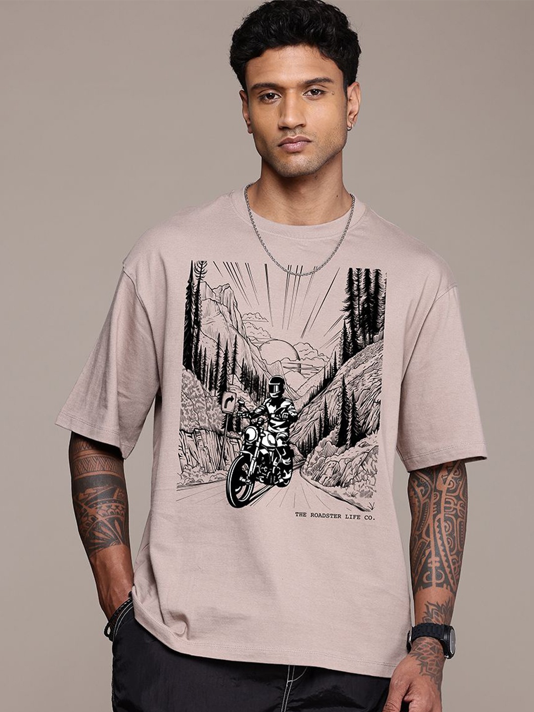 

The Roadster Lifestyle Co. Men Graphic Printed Round Neck Cotton Oversized T-Shirt, Brown