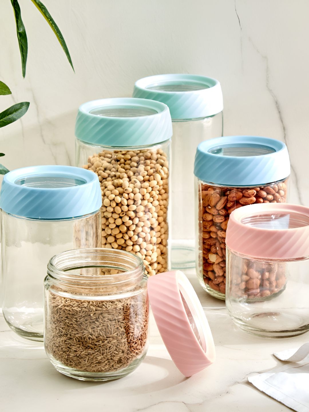 

Home Centre 6 Pieces Transparent & Pink Glass Storage Jar Set