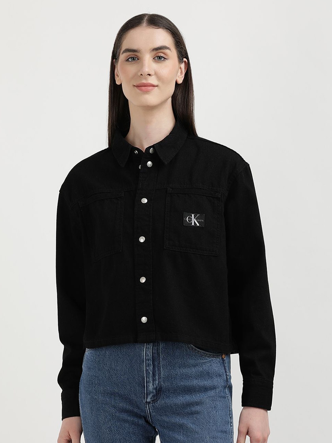 

Calvin Klein Jeans Women Spread Collar Solid Cotton Casual Shirt, Black