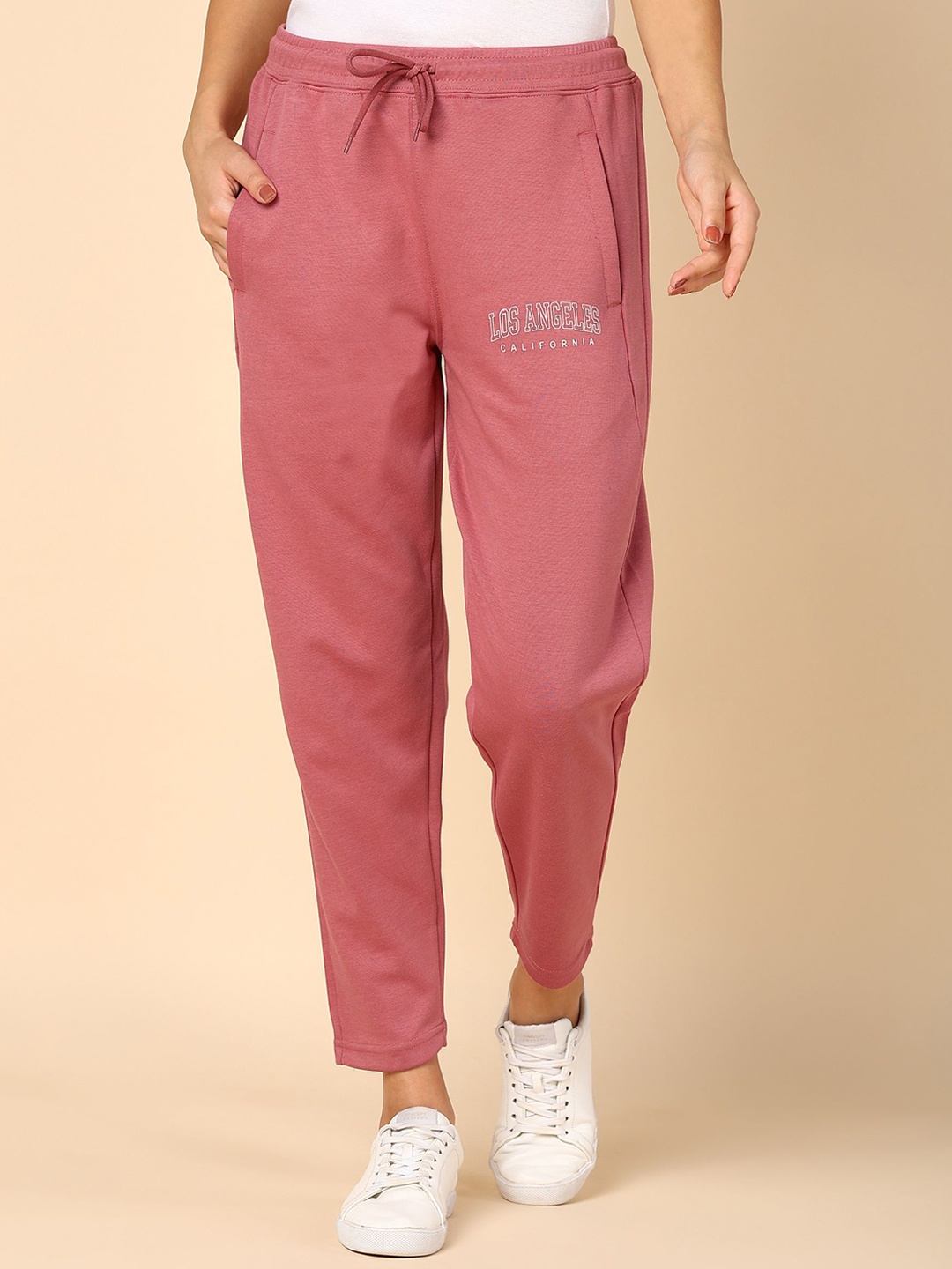 

Alan Jones Women Solid Comfort Fit Mid-Rise Track Pants, Pink