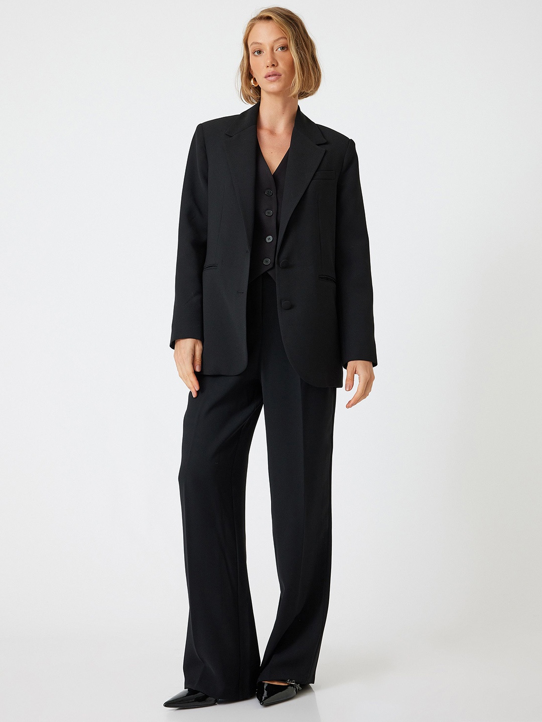 

Koton Solid Women Mid-Rise Parallel Trousers, Black