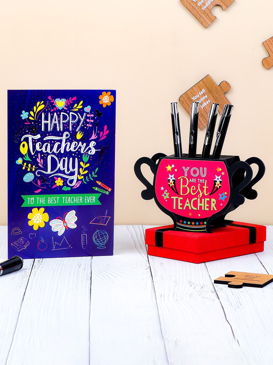 

Archies Best Teacher Printed Penstand with Beautiful Greeting Card, Red