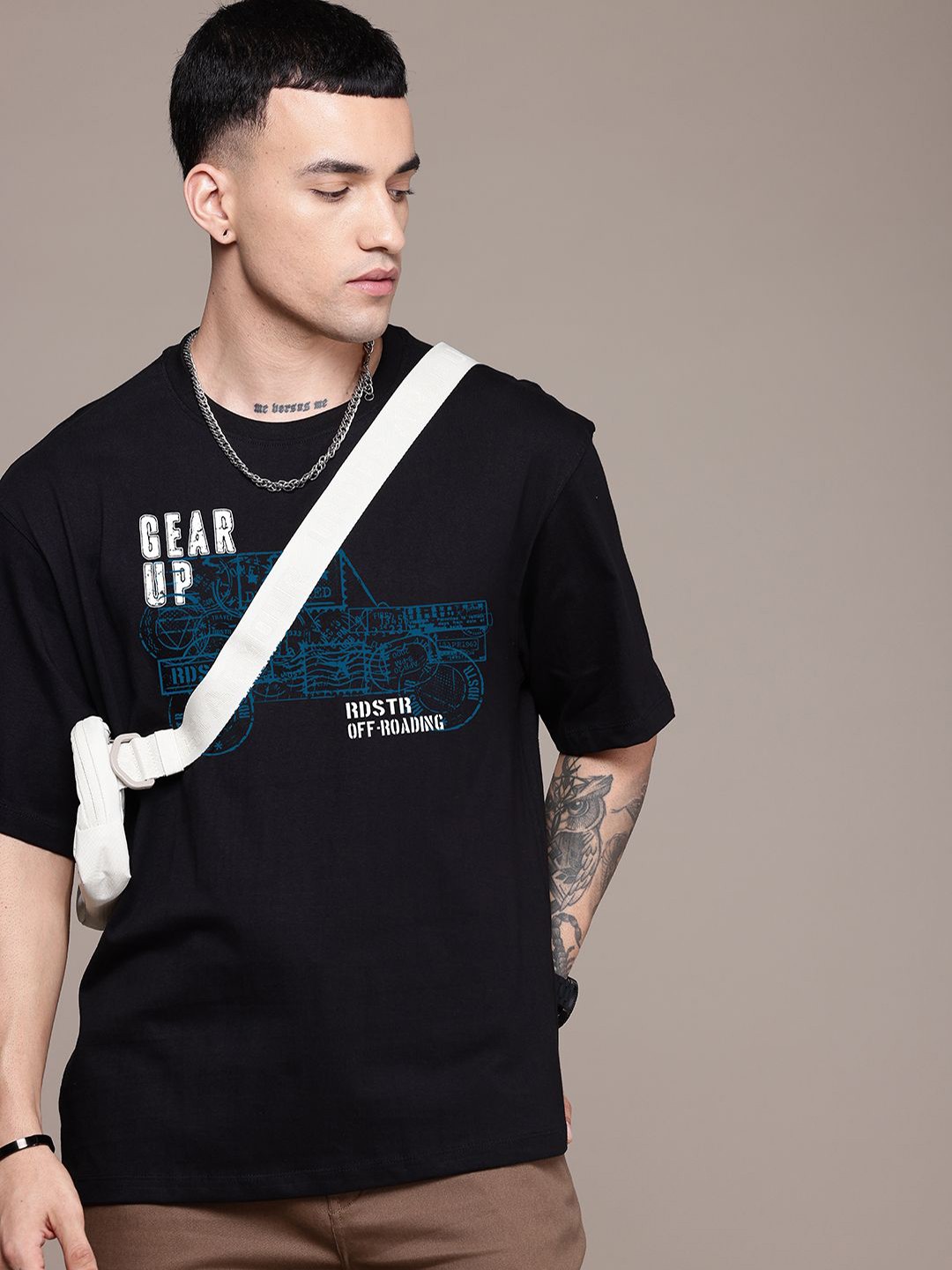 

The Roadster Lifestyle Co. Men Graphic Printed Round Neck Cotton Oversized T-Shirt, Black
