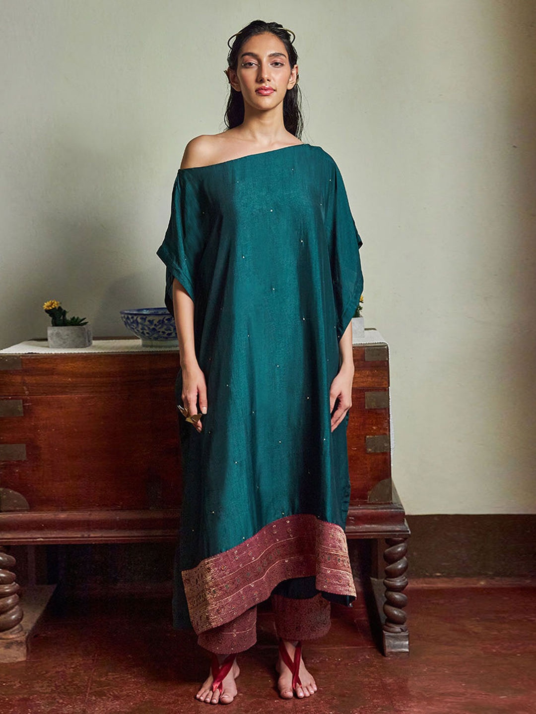 

Ganga Embroidered Off-Shoulder Flared Sleeves Raw Silk Kaftan Kurta with Palazzos, Green