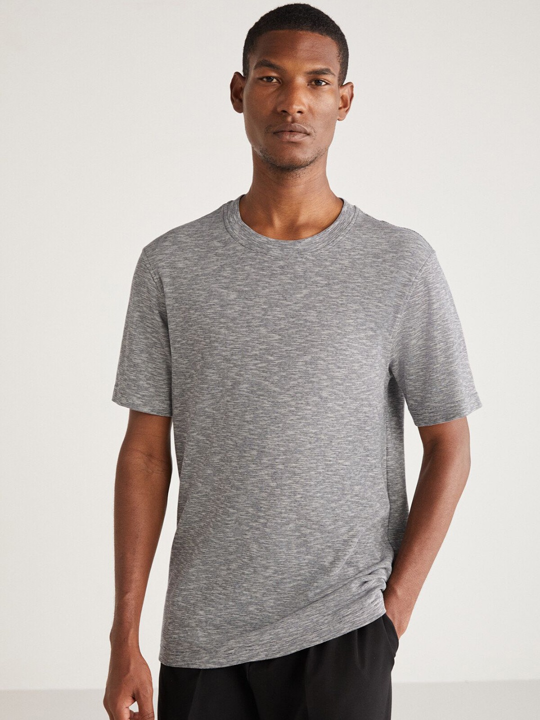 

GRIMELANGE Men Solid Round Neck Cotton T-Shirt, Grey