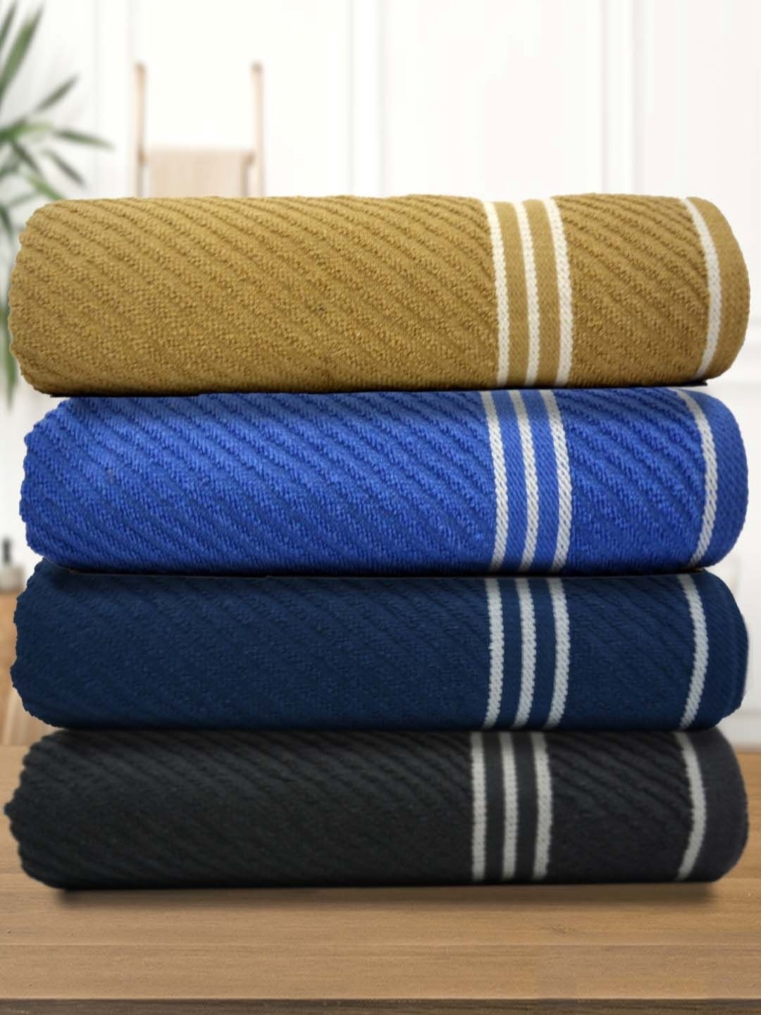 

Aura Blue & Black 4 Pcs Cotton 400 GSM Bath Towel