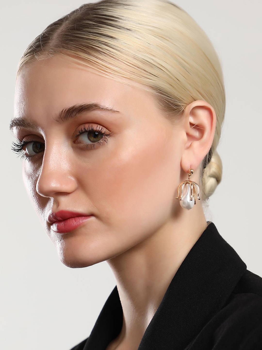 

SOHI Gold-Plated Contemporary Pearls Drop Earrings