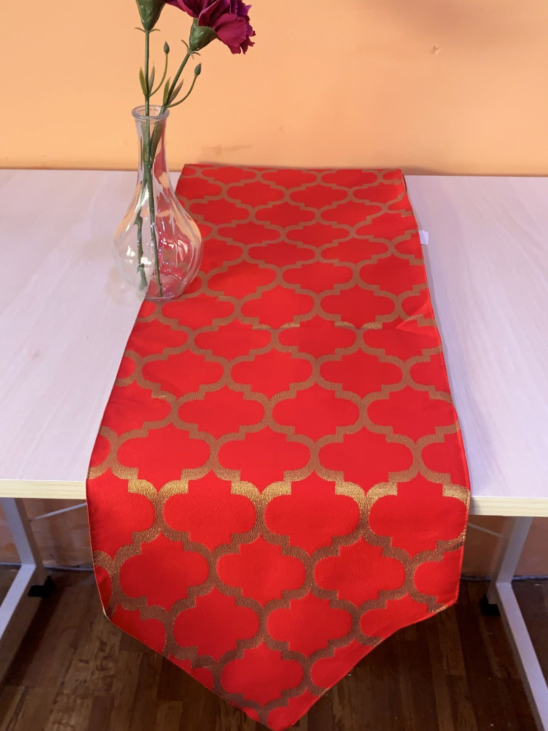 

Pink Parrot Red & Gold-Toned Ethnic Motifs Table Runner