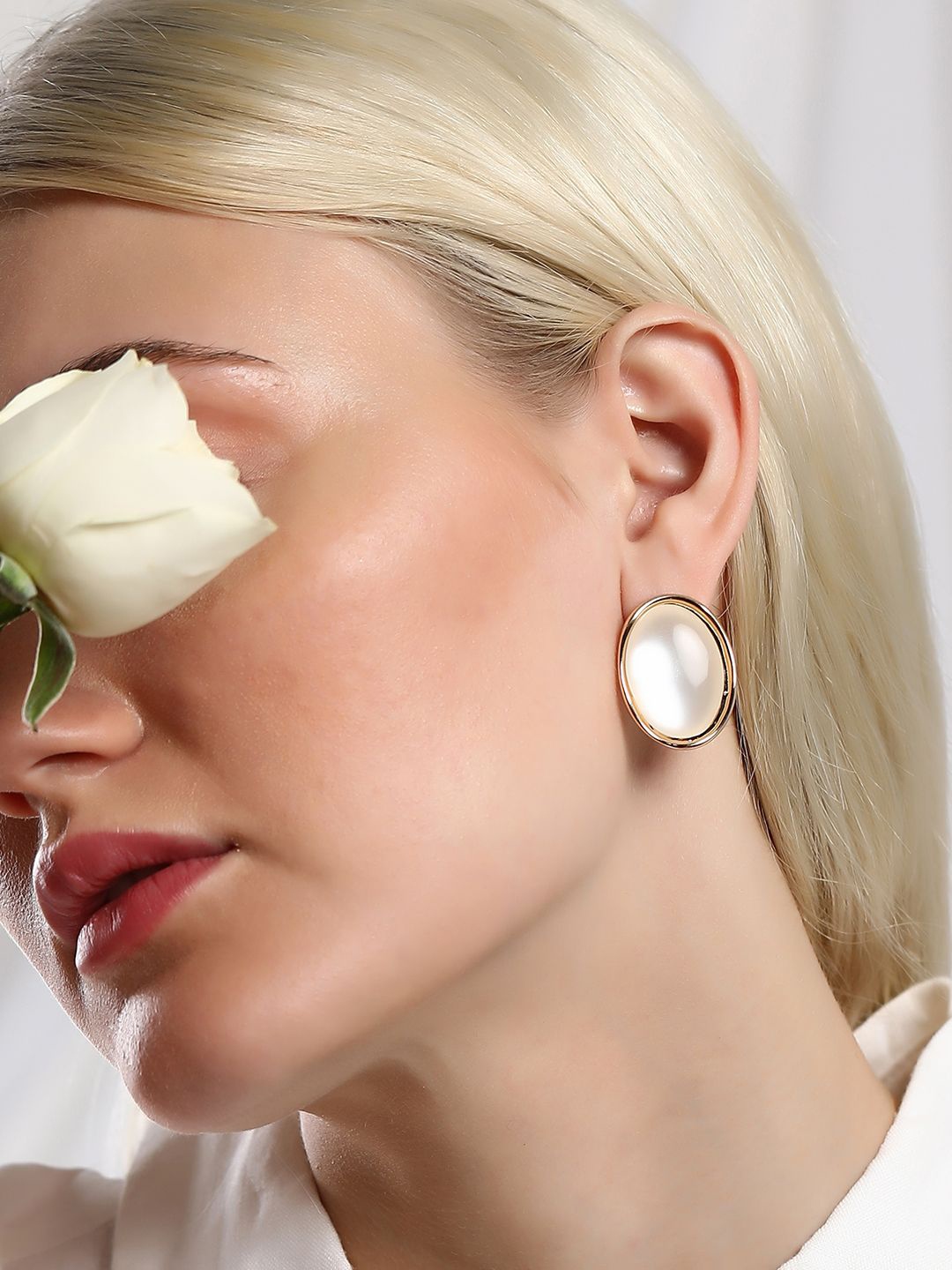 

SOHI Gold-Plated Artificial Stones Studded Oval Diana Studs Earrings, White