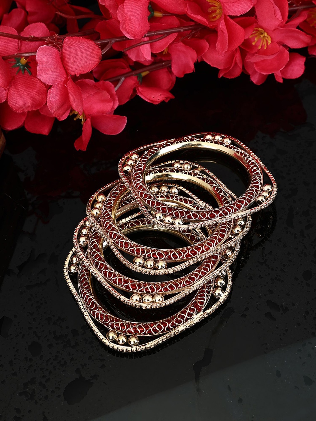 

Anouk Set Of 4 Rose Gold Plated Cubic Zirconia Stone Studded Bangle