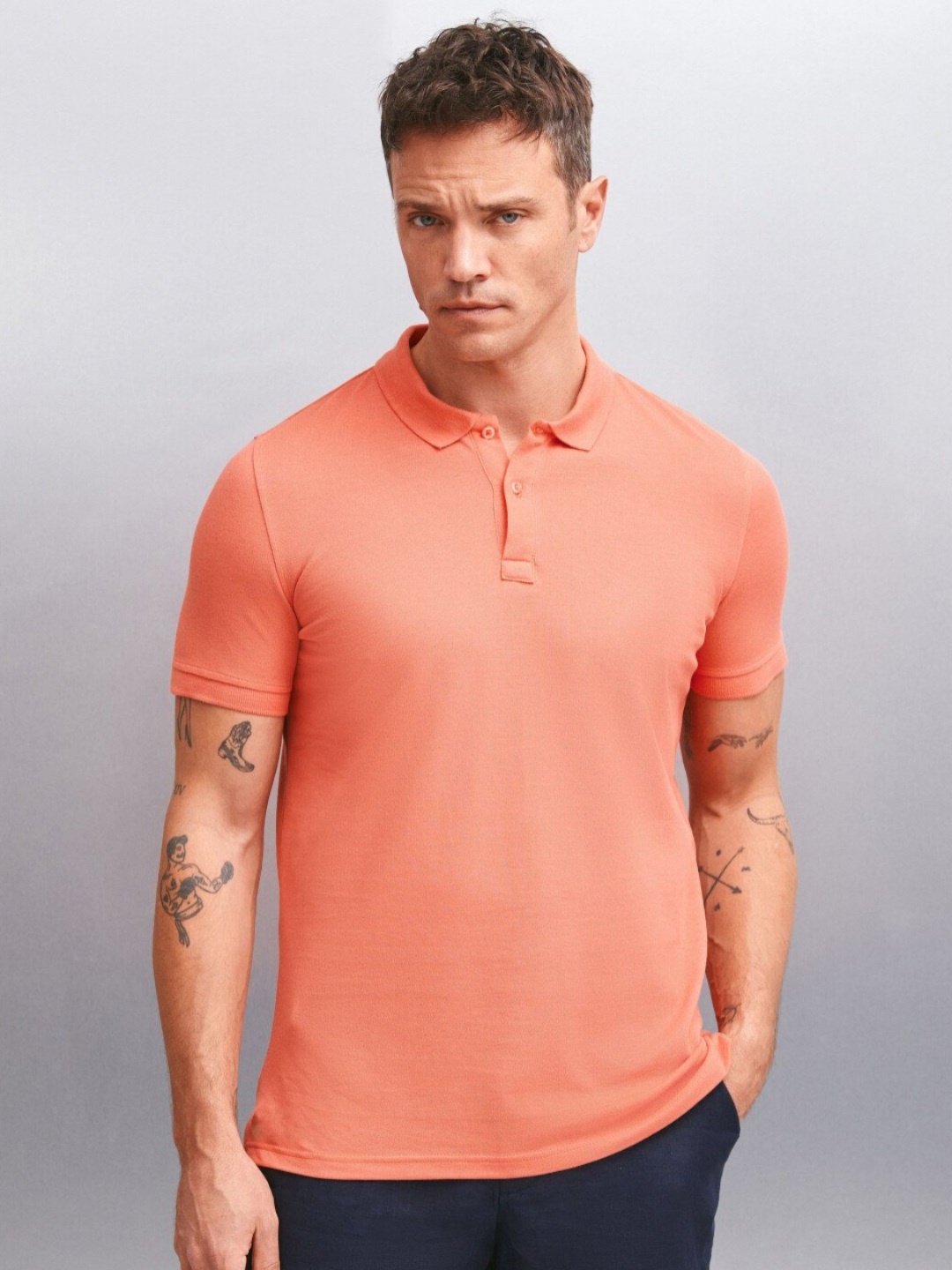 

GRIMELANGE Men Solid Polo Collar Cotton T-Shirt, Orange