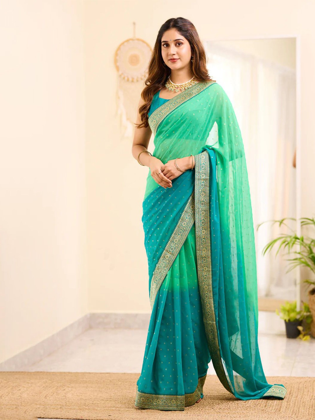 

Aika Etinic Motif Woven Design Pure Georgette Saree, Sea green