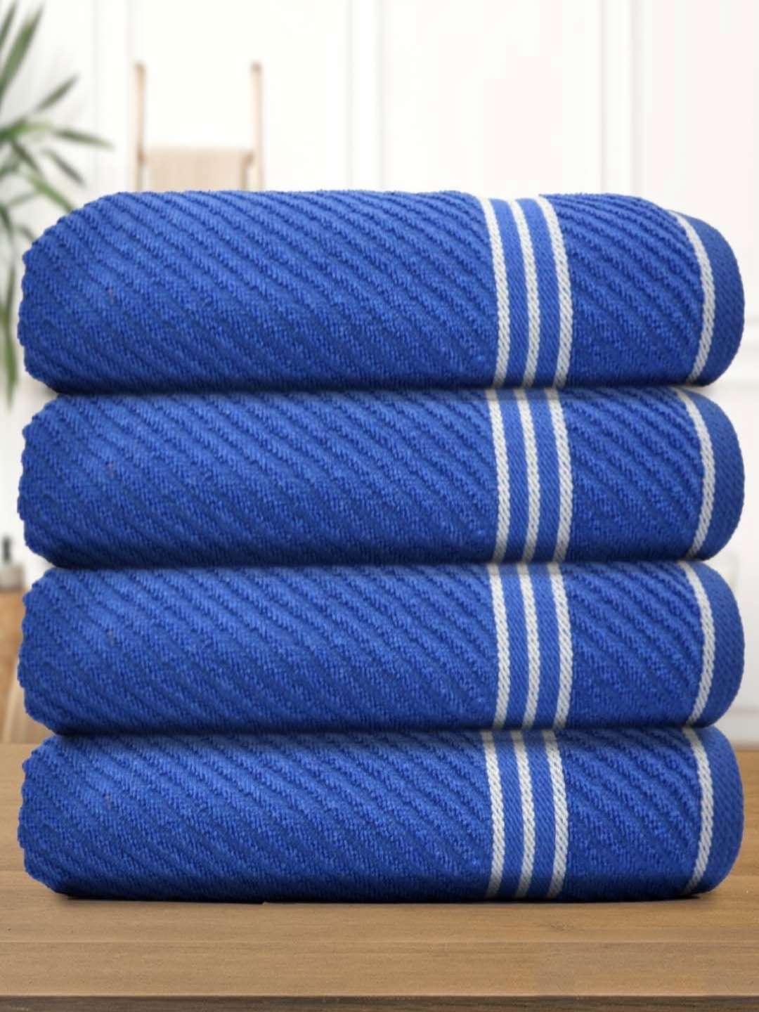

Aura Blue 4 Pieces Cotton 400 GSM Bath Towel