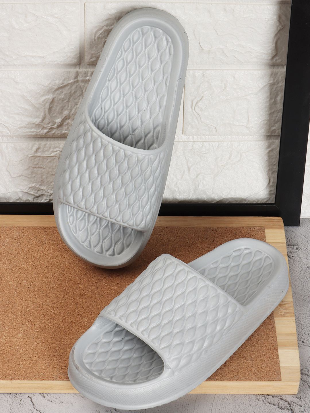 

Mast & Harbour Women Self Design Sliders Flip Flops, Grey