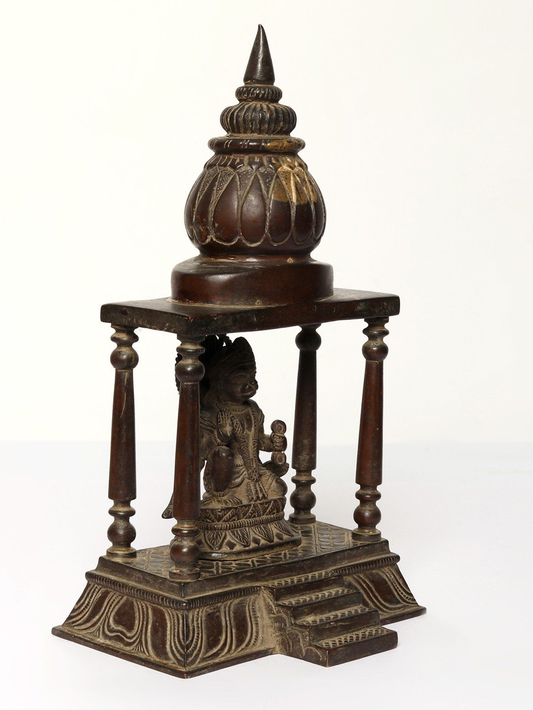 

Exotic India Brown Textured Brass Religious Idol Showpiece