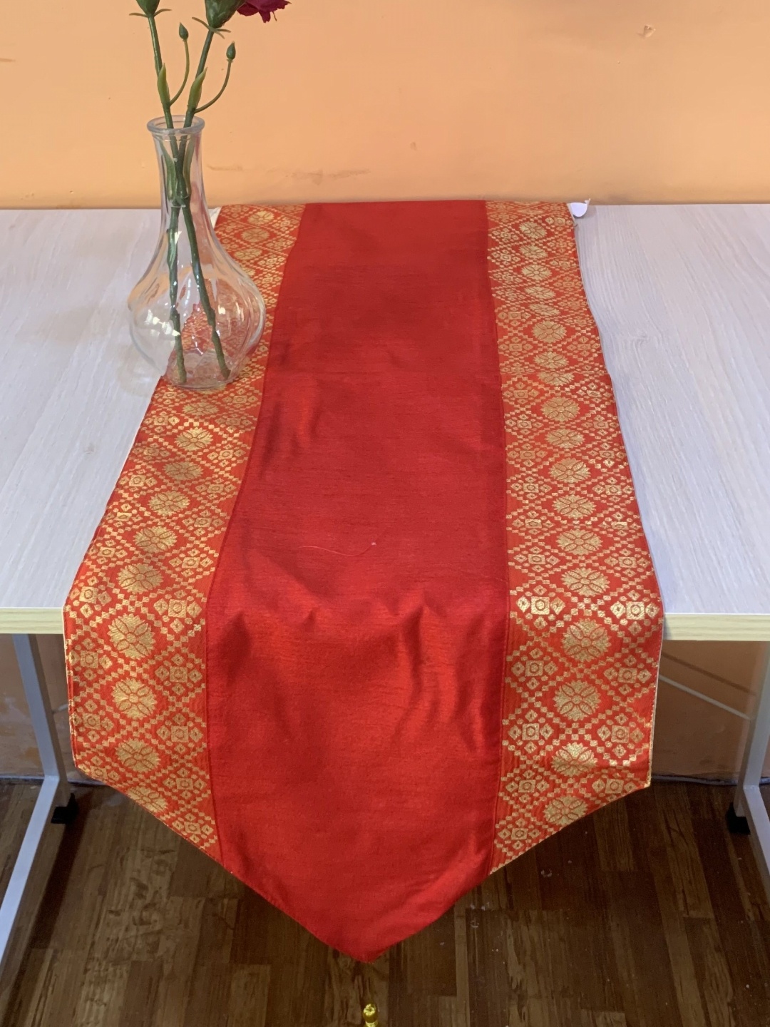 

Pink Parrot Red & Gold Toned Ethnic Motifs Table Runner