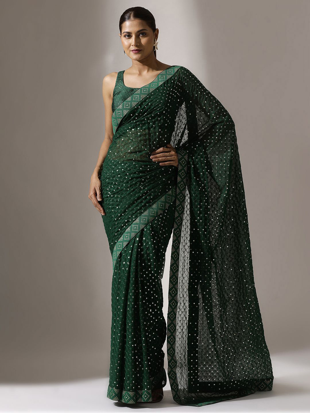 

Qahal Embellished Sequinned Pure Georgette Saree, Green