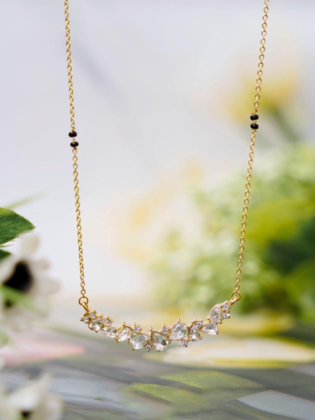 

SWASHAA Stainless Steel 14KT Gold Plated Stones Studded & Beaded Mangalsutra