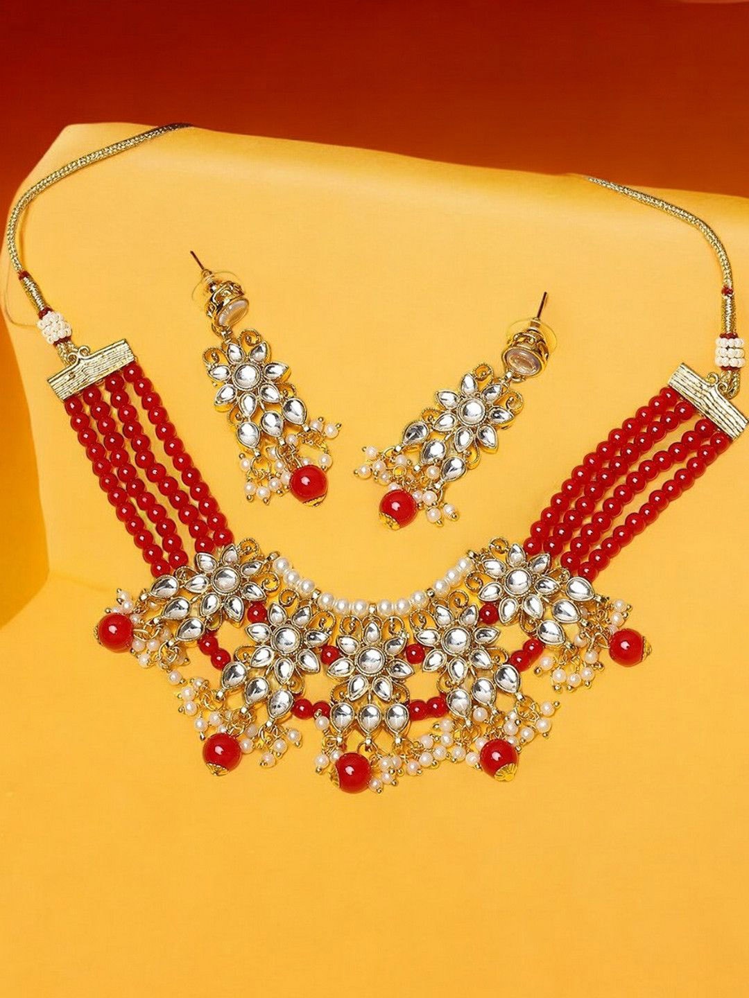 

Anouk Gold-Toned Kundan -Studded & Beaded Jewellery Set