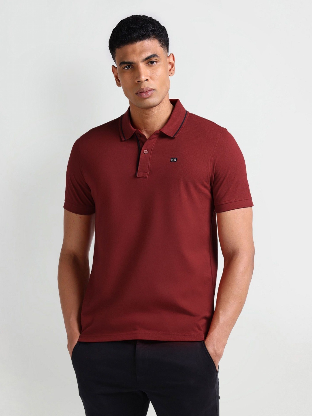 

Arrow Sport Men Solid Polo Collar Cotton T-Shirt, Red