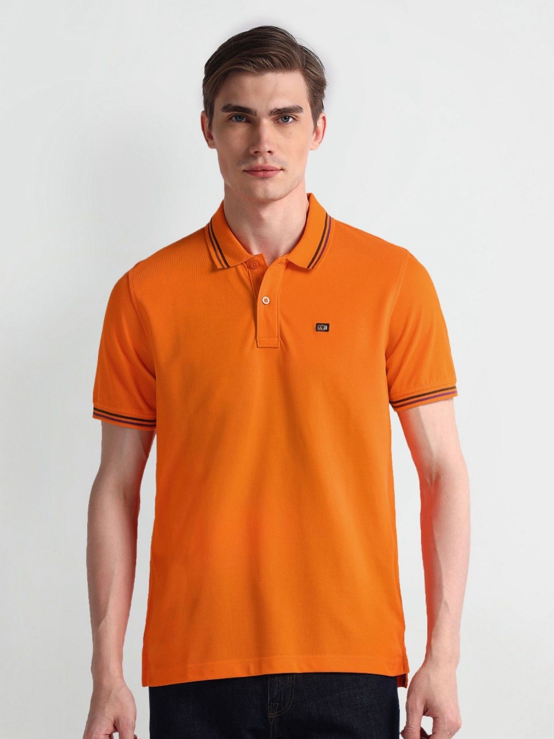 

Arrow Sport Men Solid Polo Collar Cotton T-Shirt, Orange