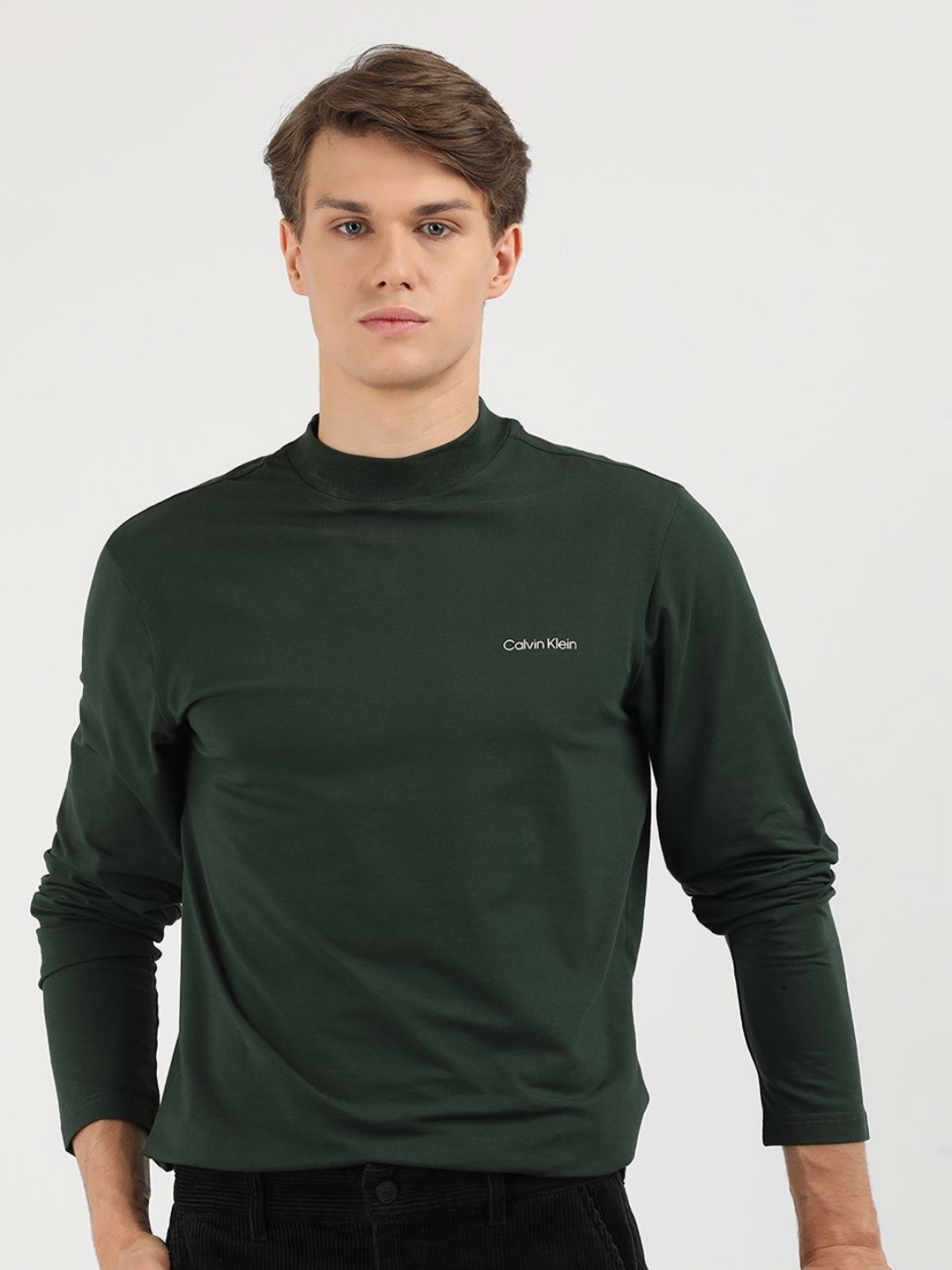 

Calvin Klein Jeans Men Solid Round Neck Cotton T-Shirt, Green