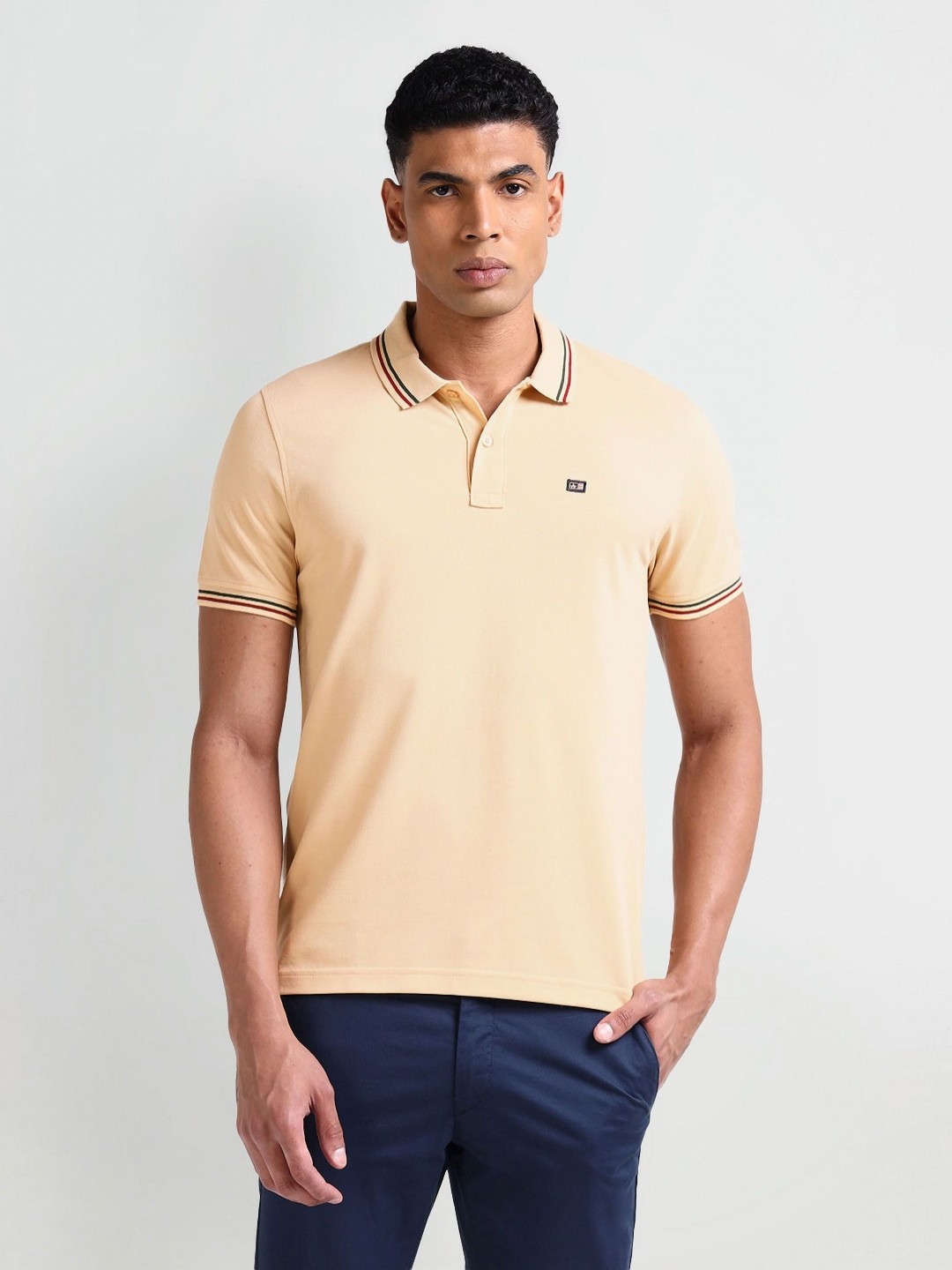 

Arrow Sport Men Solid Polo Collar Cotton T-Shirt, Brown