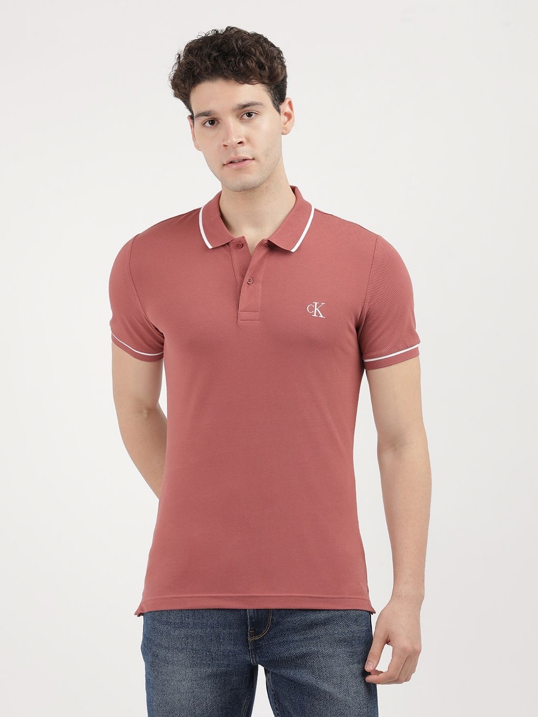 

Calvin Klein Jeans Men Solid Polo Collar Cotton Slim Fit T-shirt, Red