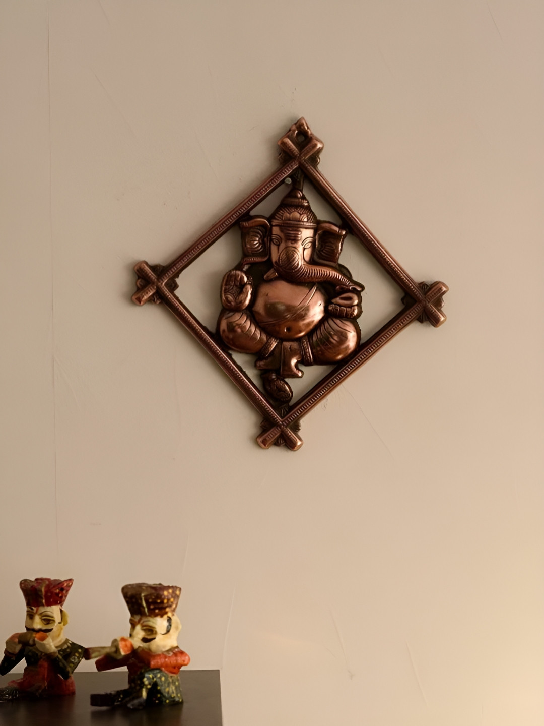 

INTERNATIONAL GIFT Brown and Black Lord Ganesh Wall Hanging