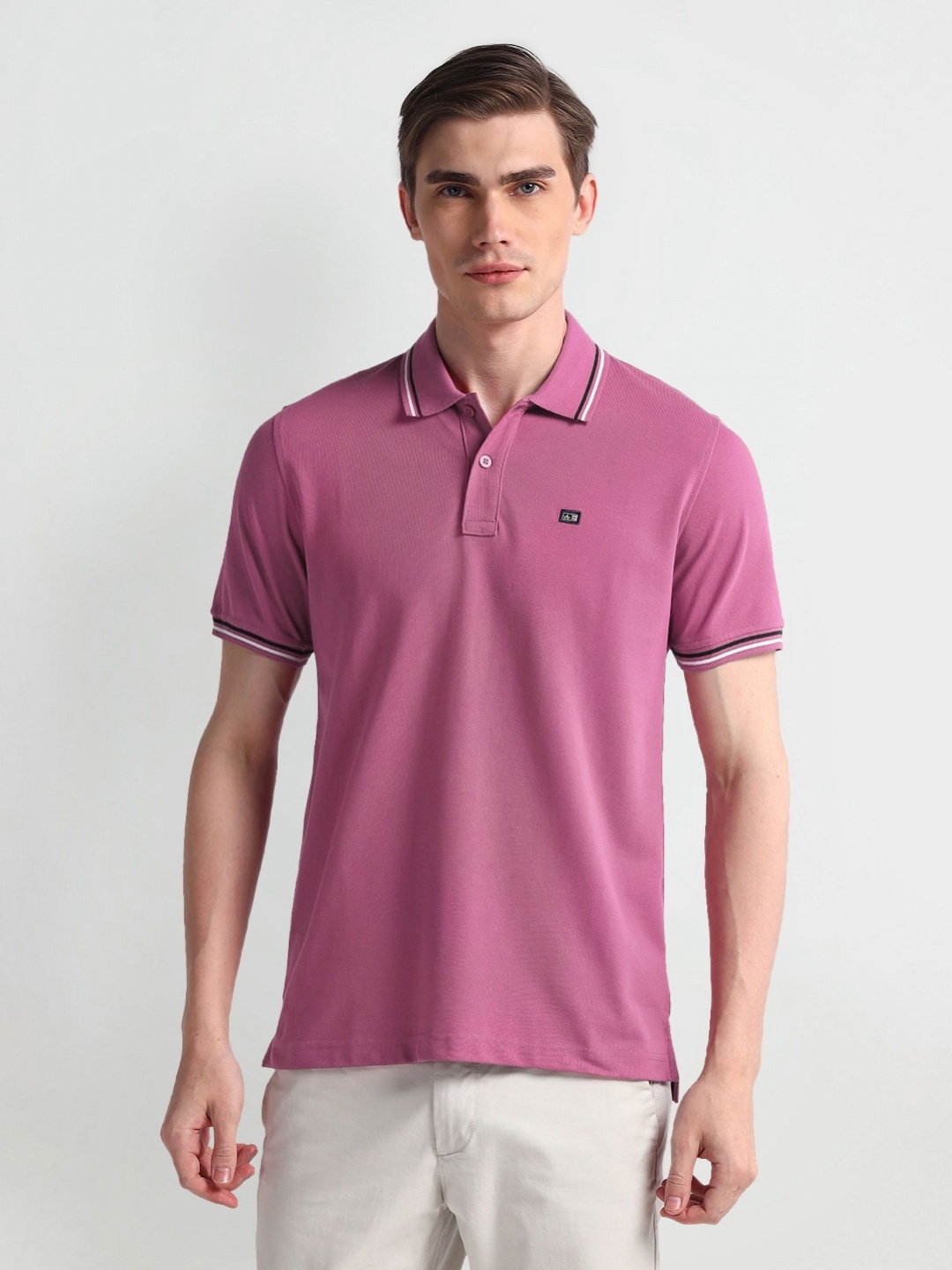 

Arrow Sport Men Solid Polo Collar Cotton T-Shirt, Purple