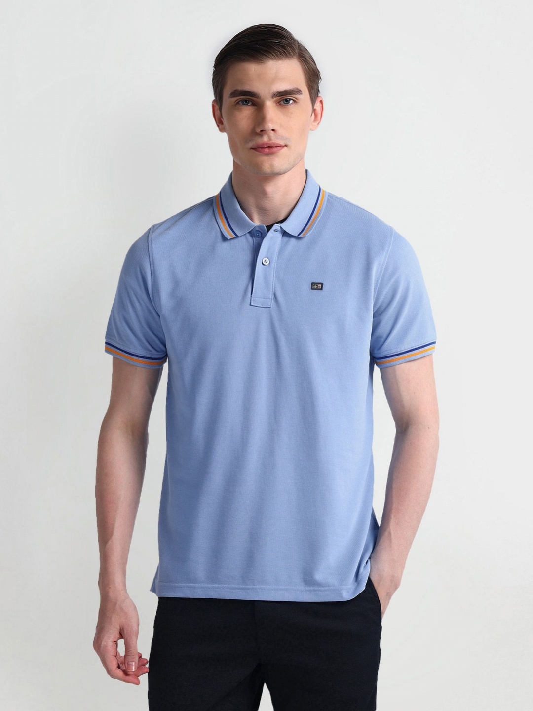 

Arrow Sport Men Solid Polo Collar Cotton T-Shirt, Blue