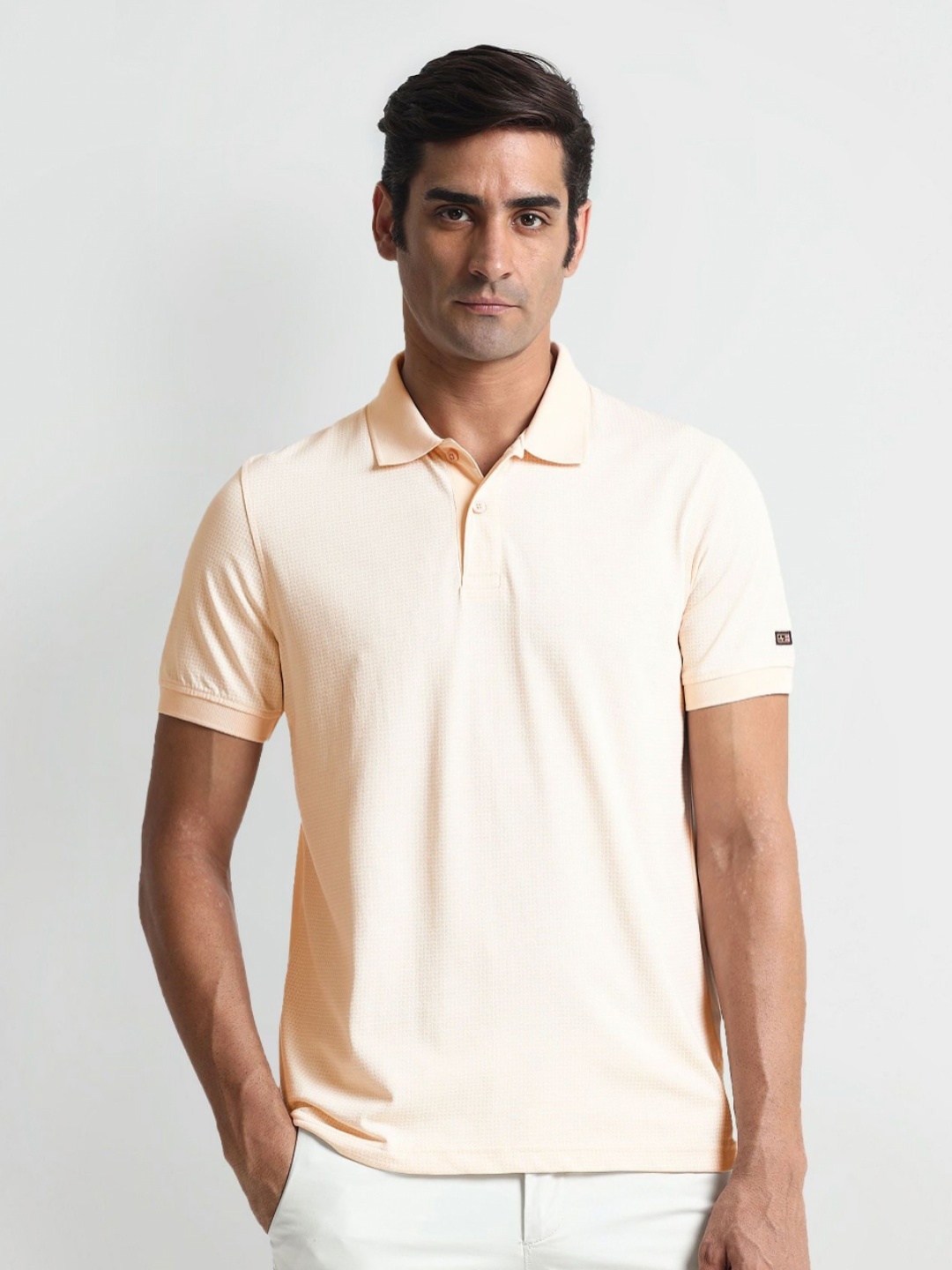 

Arrow Sport Men Solid Polo Collar Cotton T-Shirt, Orange
