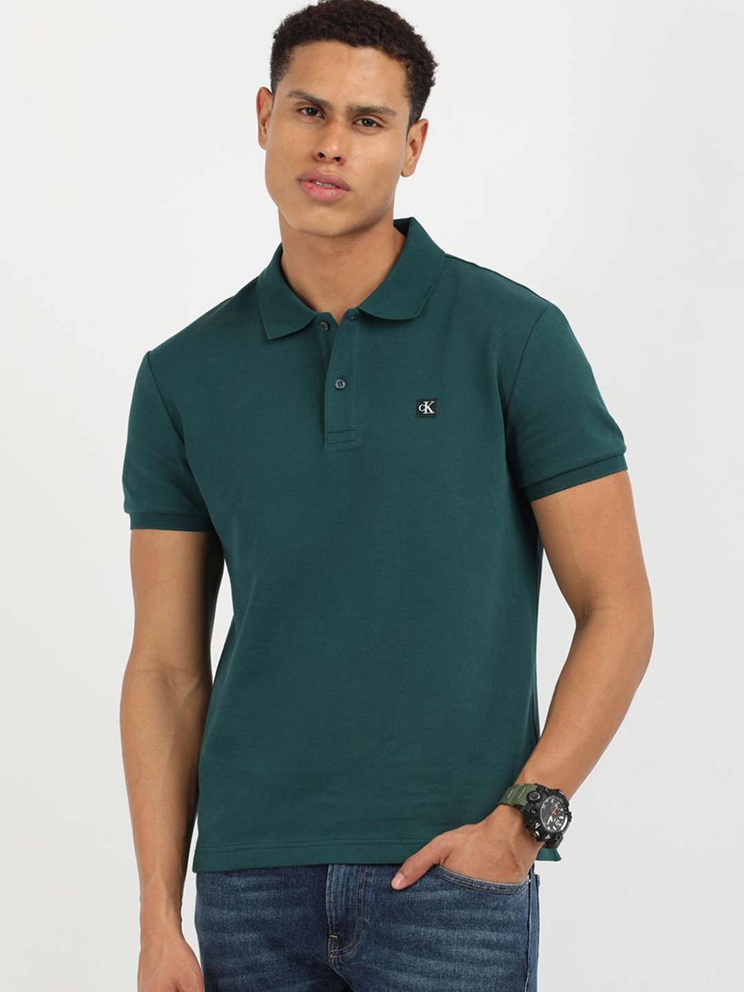 

Calvin Klein Jeans Men Solid Polo Collar Cotton T-Shirt, Green