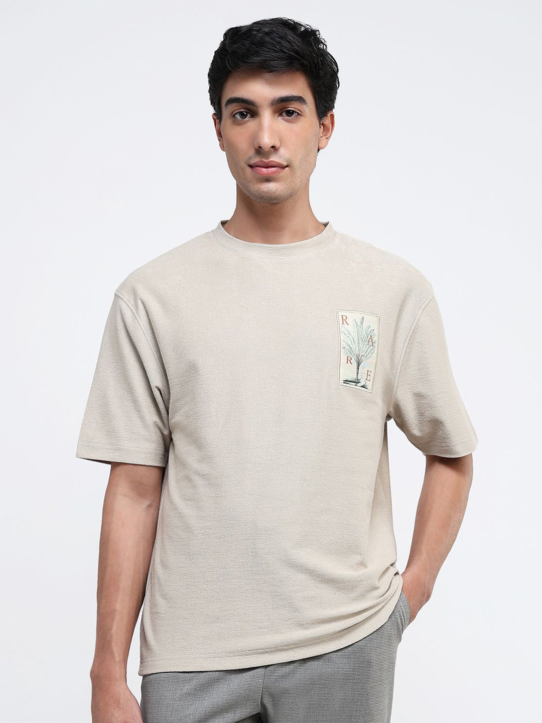 

RARE RABBIT Men Solid Round Neck Cotton T-shirt, Beige