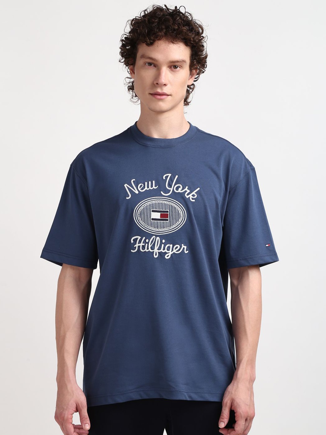 

Tommy Hilfiger Men Typography Printed Round Neck T-shirt, Blue