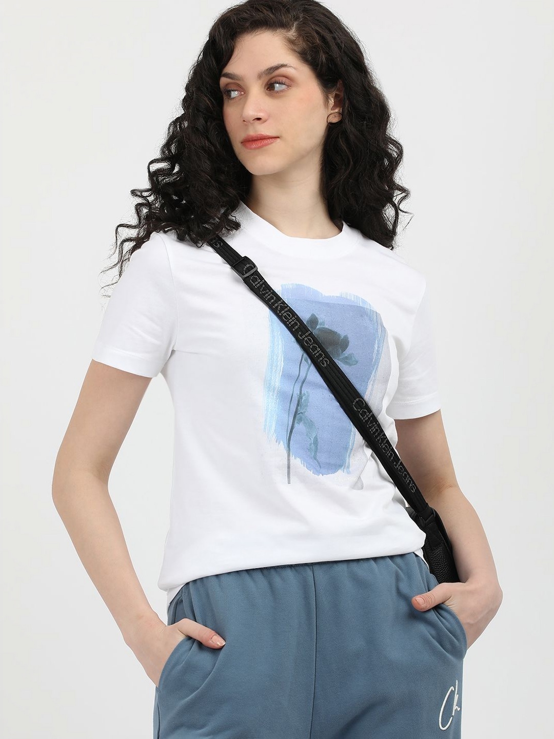 

Calvin Klein Jeans Women Graphic Printed Round Neck Cotton T-Shirt, White