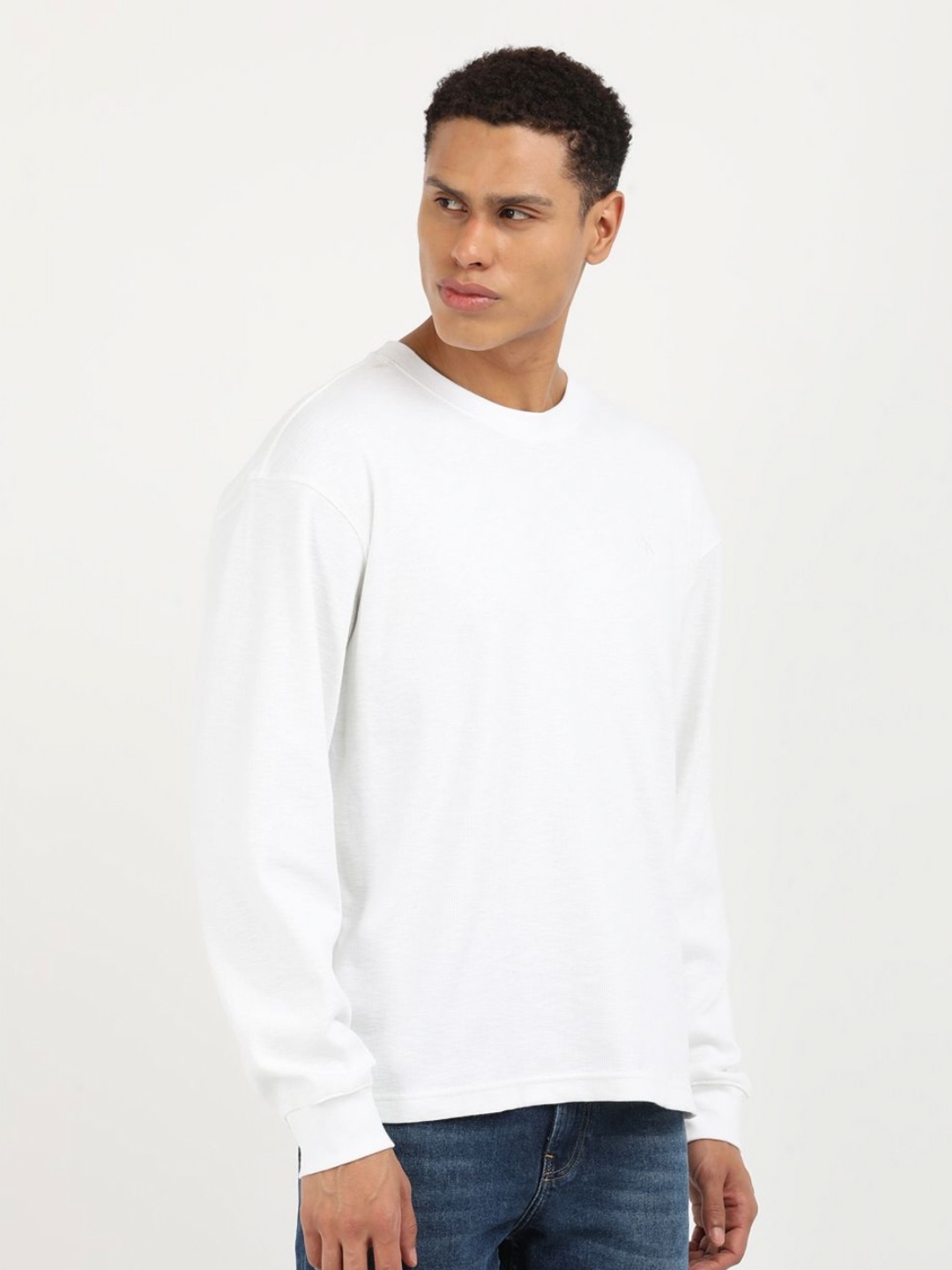 

Calvin Klein Jeans Men Solid Round Neck Cotton Relaxed Fit T-Shirt, White