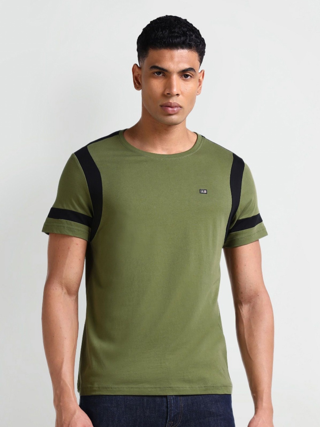 

Arrow Sport Men Solid Round Neck Cotton T-Shirt, Green