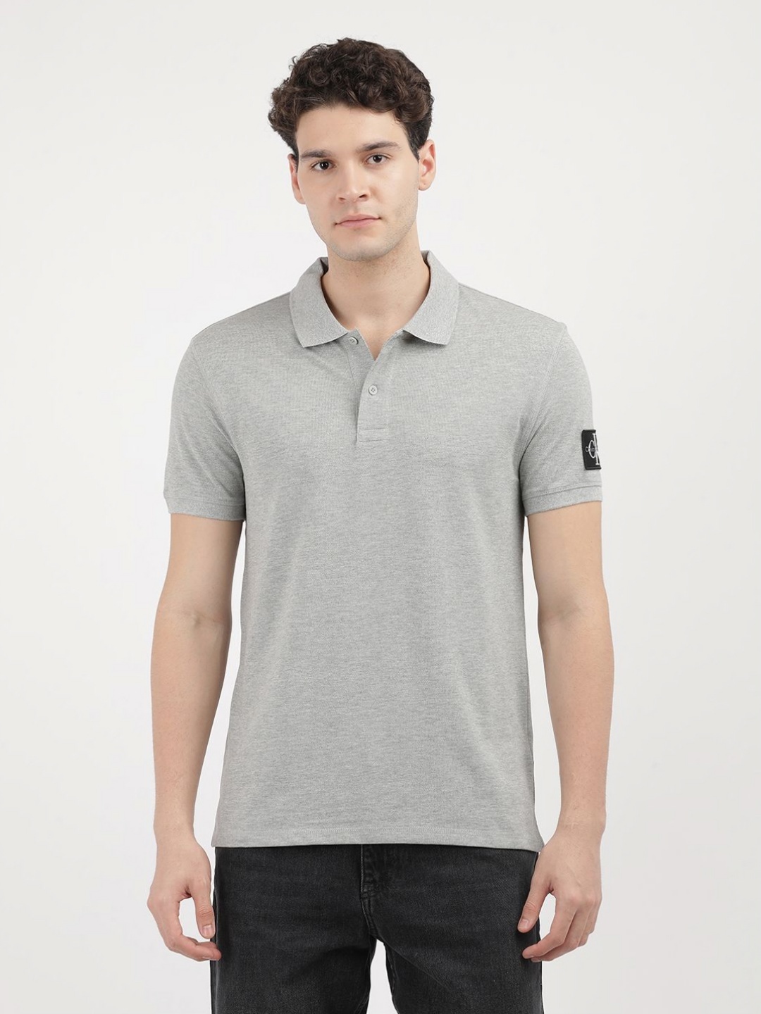 

Calvin Klein Jeans Men Solid Polo Collar Cotton T-Shirt, Grey