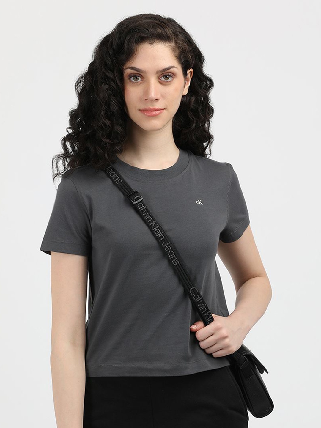 

Calvin Klein Jeans Women Solid Round Neck Cotton T-Shirt, Grey