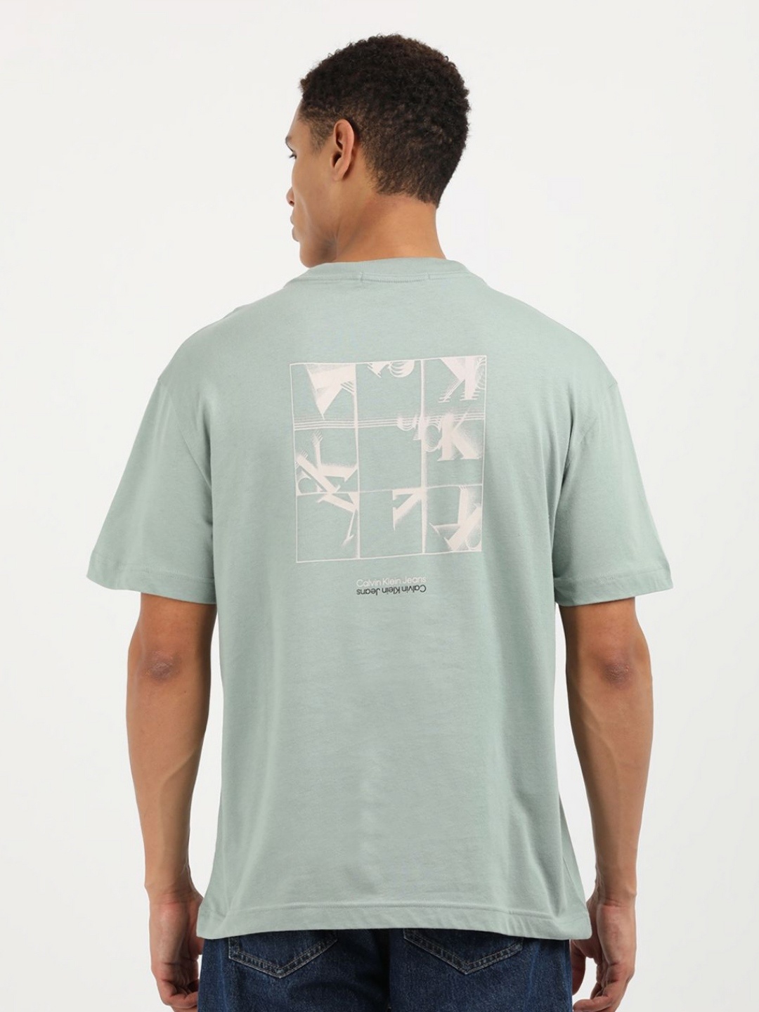 

Calvin Klein Jeans Men Graphic Printed Round Neck Cotton Relaxed Fit T-Shirt, Green