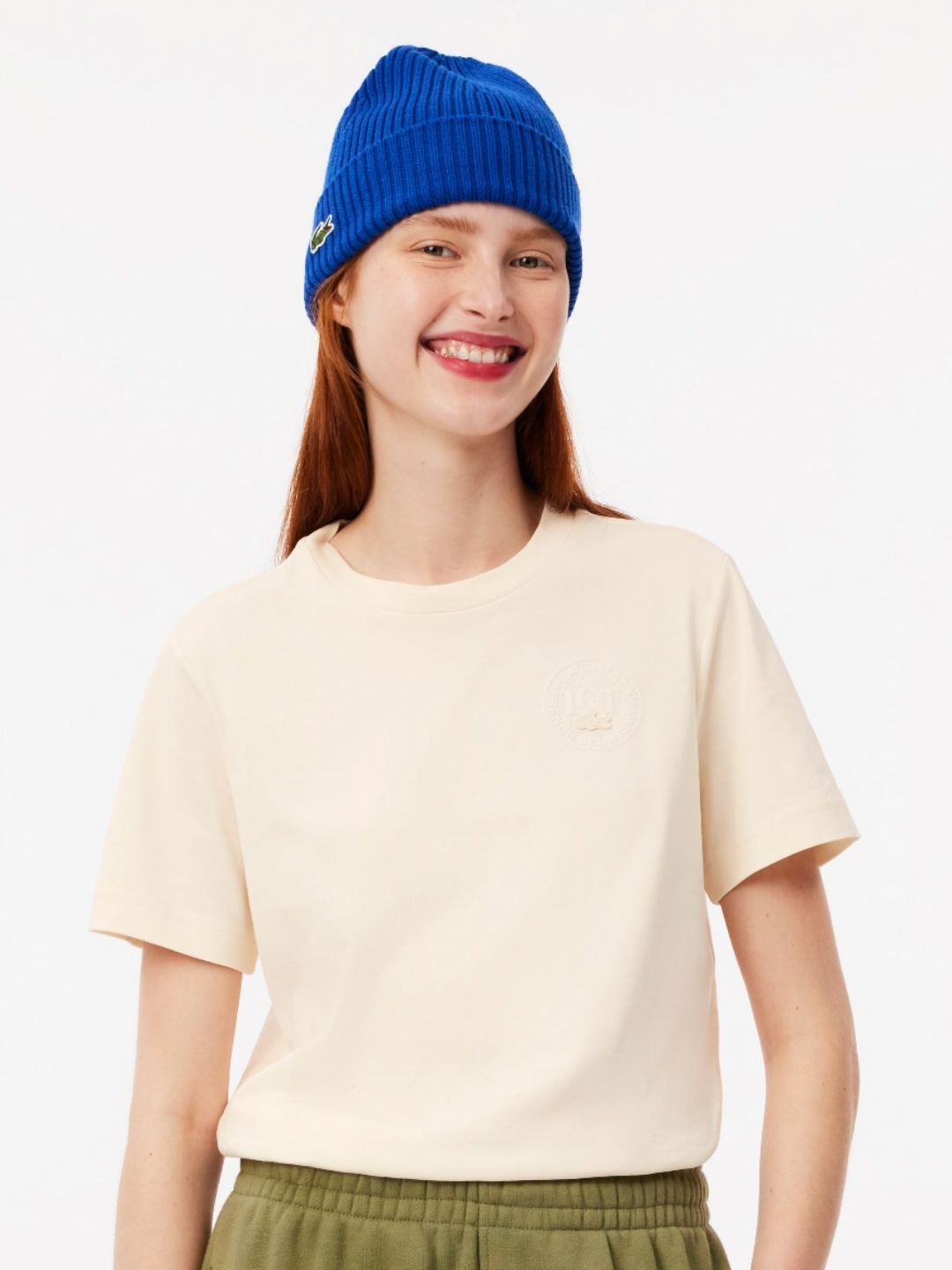 

Lacoste Women Solid Round Neck Cotton T-Shirt, Beige